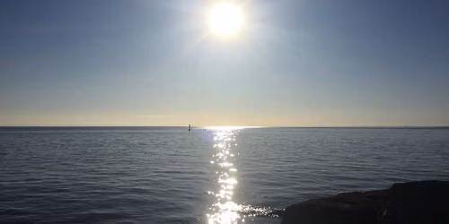 Waterfront Sunset Sits