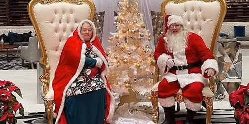 Santa and Mrs. Claus the Totzkes in the Carol Stream 4th of July parade on July 4th