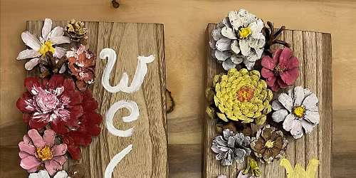 Pinecone welcome sign