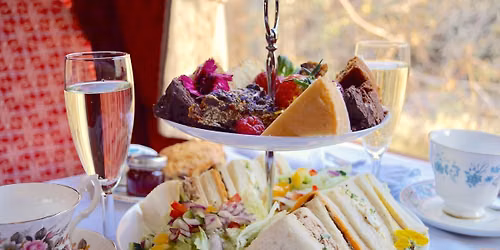 Travel by Vintage Bus for Afternoon Tea on a steam train 