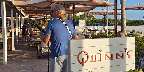 Archer at Quinn's on the Beach