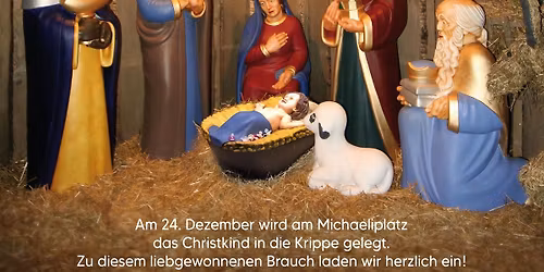 Das Christkind wird in die Krippe gelegt!