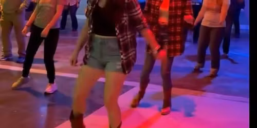 Line dancing at the Silver Saddle located at Summit Nightlife in Branson