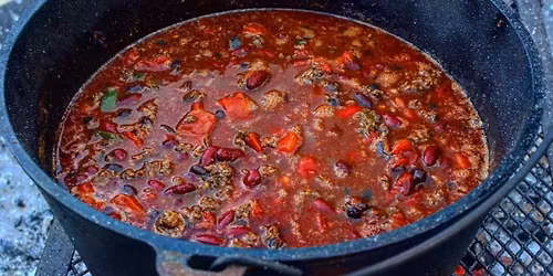 Campfire Cast-Iron Chili Cooking