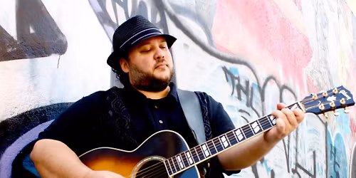 Mutlu with Gigi Greco at The Listening Booth