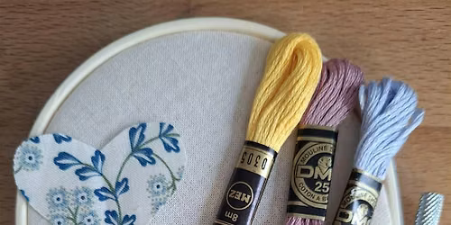 Hand-stitched embroidery hoop decoration