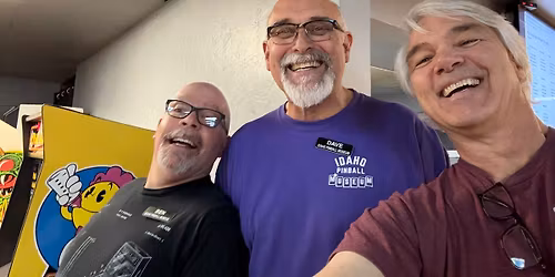 Nerds playing pinball