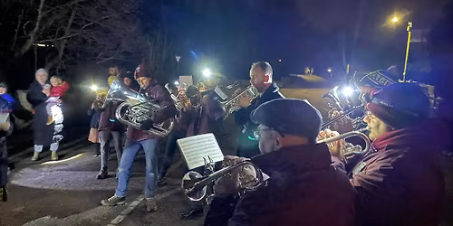 Carol singing round the village