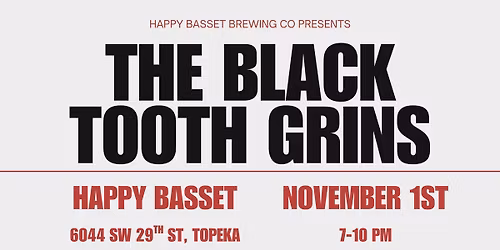 The Black Tooth Grins