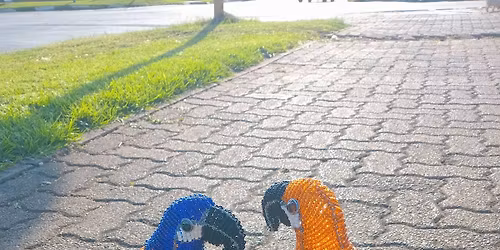 Handmade with pride wire and beads art work