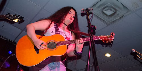 Rachel Dara performs at CanCon at Cardinal Brewing
