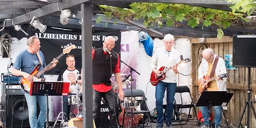 Alzheimers Blues Band og middag ved langbord