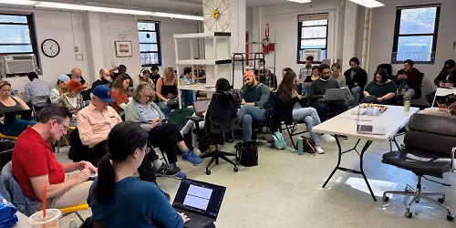 Writing group meeting at a huge\/unusual space in Alphabet City