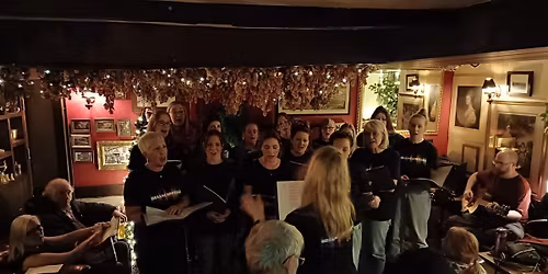Christmas Carols at The Huntsman, Ide