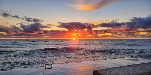 Twilight to Sunrise Yoga on the breakwater!