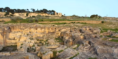Le origini di Cagliari: tramonto a Tuvixeddu