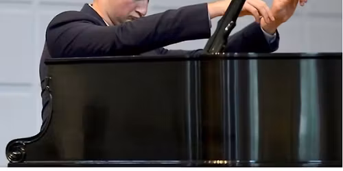 Musical March at the GHCC featuring pianist Lt. Alexander Beyer