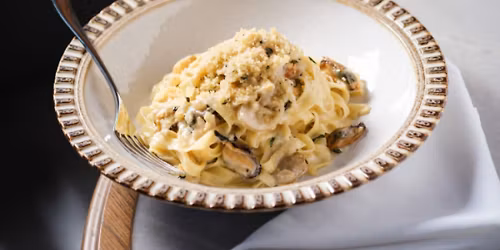 Two Chefs. Two Cities. One Table.